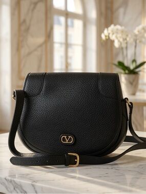 Valentino Garavani Black Pebbled Leather Crossbody Saddle Bag with Gold Hardware